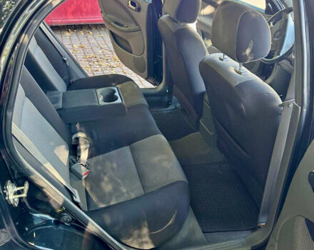 Черный Шевроле Лачетти, объемом двигателя 1.8 л и пробегом 142 тыс. км за 7400 $, фото 8 на Automoto.ua