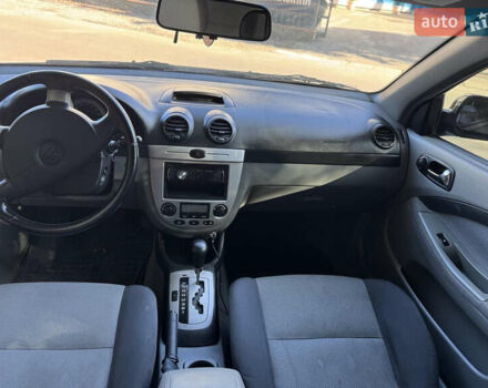 Черный Шевроле Лачетти, объемом двигателя 1.8 л и пробегом 142 тыс. км за 7400 $, фото 18 на Automoto.ua