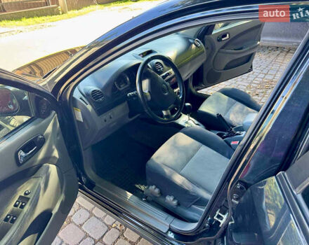 Черный Шевроле Лачетти, объемом двигателя 1.8 л и пробегом 142 тыс. км за 7400 $, фото 13 на Automoto.ua