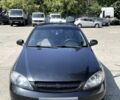 Черный Шевроле Лачетти, объемом двигателя 1.6 л и пробегом 325 тыс. км за 4500 $, фото 1 на Automoto.ua