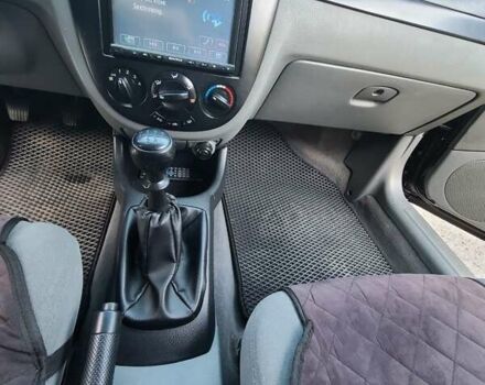 Черный Шевроле Лачетти, объемом двигателя 1.6 л и пробегом 273 тыс. км за 4500 $, фото 19 на Automoto.ua