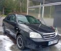 Черный Шевроле Лачетти, объемом двигателя 1.8 л и пробегом 250 тыс. км за 3600 $, фото 1 на Automoto.ua