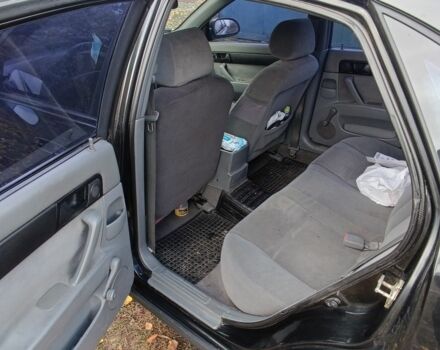 Черный Шевроле Лачетти, объемом двигателя 1.6 л и пробегом 259 тыс. км за 3500 $, фото 14 на Automoto.ua