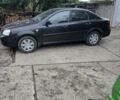 Черный Шевроле Лачетти, объемом двигателя 1.8 л и пробегом 130 тыс. км за 4900 $, фото 1 на Automoto.ua