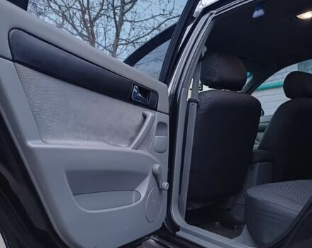 Черный Шевроле Лачетти, объемом двигателя 1.8 л и пробегом 241 тыс. км за 4300 $, фото 11 на Automoto.ua