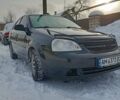 Черный Шевроле Лачетти, объемом двигателя 1.8 л и пробегом 400 тыс. км за 2700 $, фото 1 на Automoto.ua