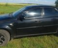 Черный Шевроле Лачетти, объемом двигателя 1.8 л и пробегом 300 тыс. км за 4200 $, фото 1 на Automoto.ua