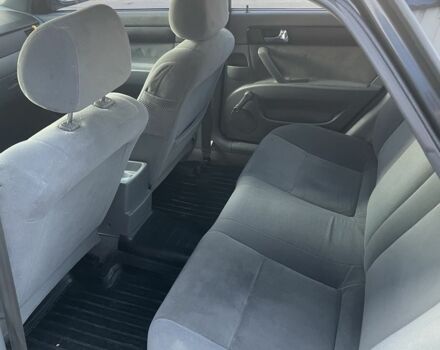 Черный Шевроле Лачетти, объемом двигателя 1.8 л и пробегом 298 тыс. км за 4200 $, фото 6 на Automoto.ua