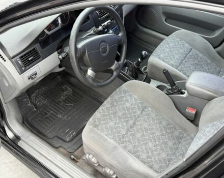 Черный Шевроле Лачетти, объемом двигателя 1.8 л и пробегом 171 тыс. км за 4300 $, фото 6 на Automoto.ua