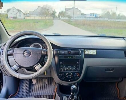 Черный Шевроле Лачетти, объемом двигателя 1.8 л и пробегом 150 тыс. км за 3200 $, фото 13 на Automoto.ua