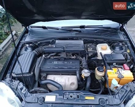 Черный Шевроле Лачетти, объемом двигателя 1.8 л и пробегом 241 тыс. км за 4300 $, фото 6 на Automoto.ua