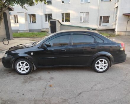 Черный Шевроле Лачетти, объемом двигателя 1.8 л и пробегом 250 тыс. км за 3650 $, фото 1 на Automoto.ua