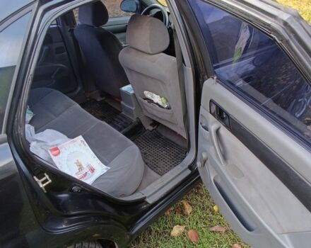 Черный Шевроле Лачетти, объемом двигателя 1.6 л и пробегом 259 тыс. км за 3500 $, фото 13 на Automoto.ua