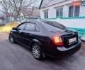 Черный Шевроле Лачетти, объемом двигателя 1.8 л и пробегом 241 тыс. км за 4300 $, фото 1 на Automoto.ua
