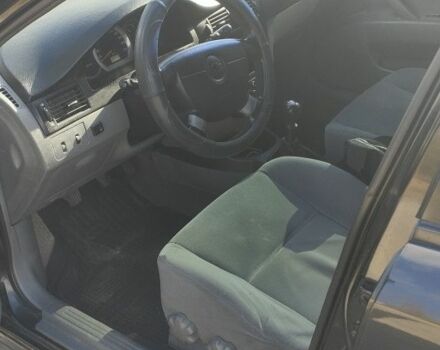 Черный Шевроле Лачетти, объемом двигателя 1.8 л и пробегом 362 тыс. км за 4209 $, фото 2 на Automoto.ua