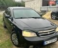 Черный Шевроле Лачетти, объемом двигателя 1.8 л и пробегом 391 тыс. км за 2700 $, фото 1 на Automoto.ua
