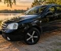 Черный Шевроле Лачетти, объемом двигателя 1.8 л и пробегом 374 тыс. км за 3700 $, фото 1 на Automoto.ua