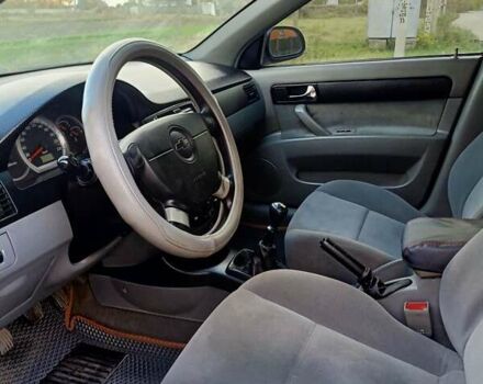 Черный Шевроле Лачетти, объемом двигателя 1.8 л и пробегом 150 тыс. км за 3200 $, фото 15 на Automoto.ua