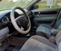 Черный Шевроле Лачетти, объемом двигателя 1.8 л и пробегом 150 тыс. км за 3200 $, фото 15 на Automoto.ua