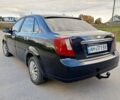 Черный Шевроле Лачетти, объемом двигателя 1.8 л и пробегом 150 тыс. км за 3200 $, фото 2 на Automoto.ua