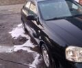 Черный Шевроле Лачетти, объемом двигателя 1.6 л и пробегом 395 тыс. км за 2999 $, фото 1 на Automoto.ua