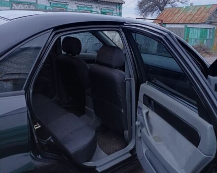 Черный Шевроле Лачетти, объемом двигателя 1.8 л и пробегом 241 тыс. км за 4300 $, фото 9 на Automoto.ua