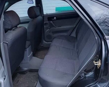 Черный Шевроле Лачетти, объемом двигателя 1.8 л и пробегом 241 тыс. км за 4300 $, фото 2 на Automoto.ua