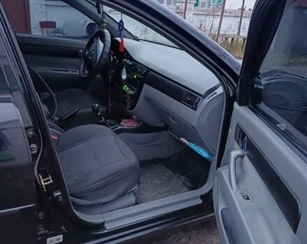 Черный Шевроле Лачетти, объемом двигателя 1.8 л и пробегом 241 тыс. км за 4300 $, фото 7 на Automoto.ua