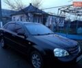Черный Шевроле Лачетти, объемом двигателя 1.6 л и пробегом 195 тыс. км за 3350 $, фото 2 на Automoto.ua