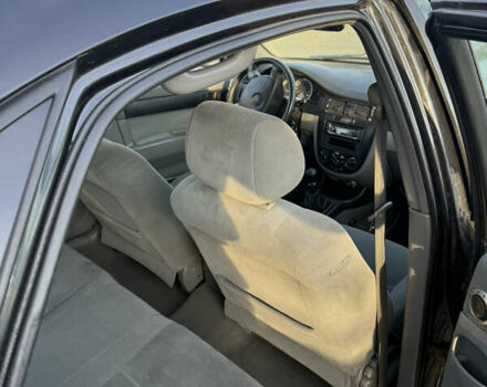 Черный Шевроле Лачетти, объемом двигателя 1.6 л и пробегом 180 тыс. км за 2200 $, фото 1 на Automoto.ua