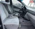 Черный Шевроле Лачетти, объемом двигателя 1.6 л и пробегом 280 тыс. км за 2999 $, фото 39 на Automoto.ua