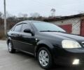 Черный Шевроле Лачетти, объемом двигателя 1.8 л и пробегом 153 тыс. км за 4300 $, фото 1 на Automoto.ua