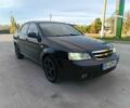 Черный Шевроле Лачетти, объемом двигателя 1.6 л и пробегом 230 тыс. км за 3600 $, фото 1 на Automoto.ua