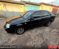 Черный Шевроле Лачетти, объемом двигателя 1.8 л и пробегом 266 тыс. км за 3450 $, фото 1 на Automoto.ua