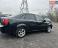 Черный Шевроле Лачетти, объемом двигателя 1.6 л и пробегом 280 тыс. км за 2999 $, фото 7 на Automoto.ua