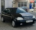 Черный Шевроле Лачетти, объемом двигателя 1.8 л и пробегом 246 тыс. км за 2250 $, фото 1 на Automoto.ua