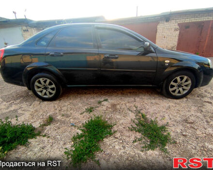 Черный Шевроле Лачетти, объемом двигателя 1.8 л и пробегом 266 тыс. км за 3450 $, фото 11 на Automoto.ua