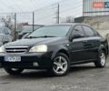 Черный Шевроле Лачетти, объемом двигателя 1.6 л и пробегом 280 тыс. км за 2999 $, фото 1 на Automoto.ua
