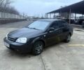 Черный Шевроле Лачетти, объемом двигателя 1.8 л и пробегом 220 тыс. км за 2950 $, фото 1 на Automoto.ua