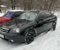 Черный Шевроле Лачетти, объемом двигателя 1.8 л и пробегом 210 тыс. км за 4650 $, фото 1 на Automoto.ua