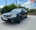 Черный Шевроле Лачетти, объемом двигателя 1.6 л и пробегом 240 тыс. км за 4299 $, фото 1 на Automoto.ua
