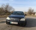 Черный Шевроле Лачетти, объемом двигателя 1.6 л и пробегом 233 тыс. км за 4500 $, фото 1 на Automoto.ua