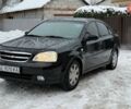 Черный Шевроле Лачетти, объемом двигателя 1.8 л и пробегом 176 тыс. км за 3800 $, фото 1 на Automoto.ua