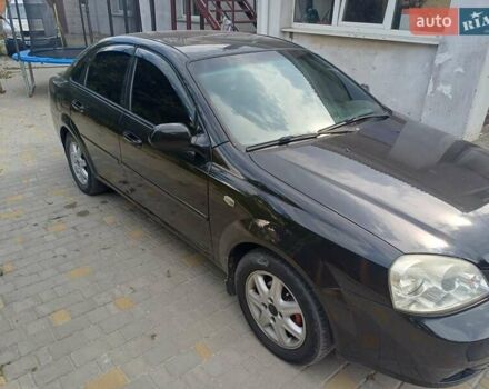 Черный Шевроле Лачетти, объемом двигателя 1.6 л и пробегом 293 тыс. км за 3700 $, фото 2 на Automoto.ua