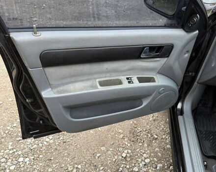 Чорний Шевроле Лачетті, об'ємом двигуна 1.8 л та пробігом 138 тис. км за 3999 $, фото 11 на Automoto.ua