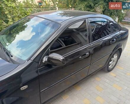 Черный Шевроле Лачетти, объемом двигателя 1.6 л и пробегом 293 тыс. км за 3700 $, фото 6 на Automoto.ua