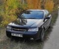 Черный Шевроле Лачетти, объемом двигателя 1.8 л и пробегом 300 тыс. км за 2850 $, фото 1 на Automoto.ua