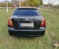 Черный Шевроле Лачетти, объемом двигателя 1.8 л и пробегом 360 тыс. км за 3300 $, фото 6 на Automoto.ua