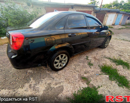 Черный Шевроле Лачетти, объемом двигателя 1.8 л и пробегом 266 тыс. км за 3450 $, фото 4 на Automoto.ua