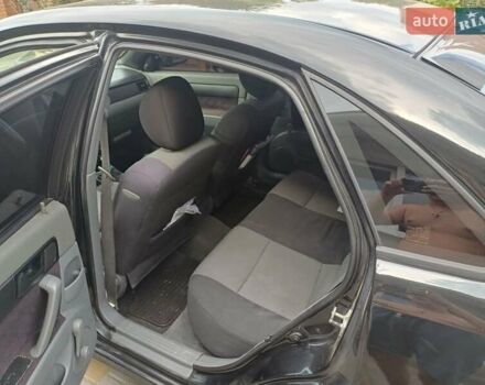 Черный Шевроле Лачетти, объемом двигателя 1.6 л и пробегом 293 тыс. км за 3700 $, фото 8 на Automoto.ua